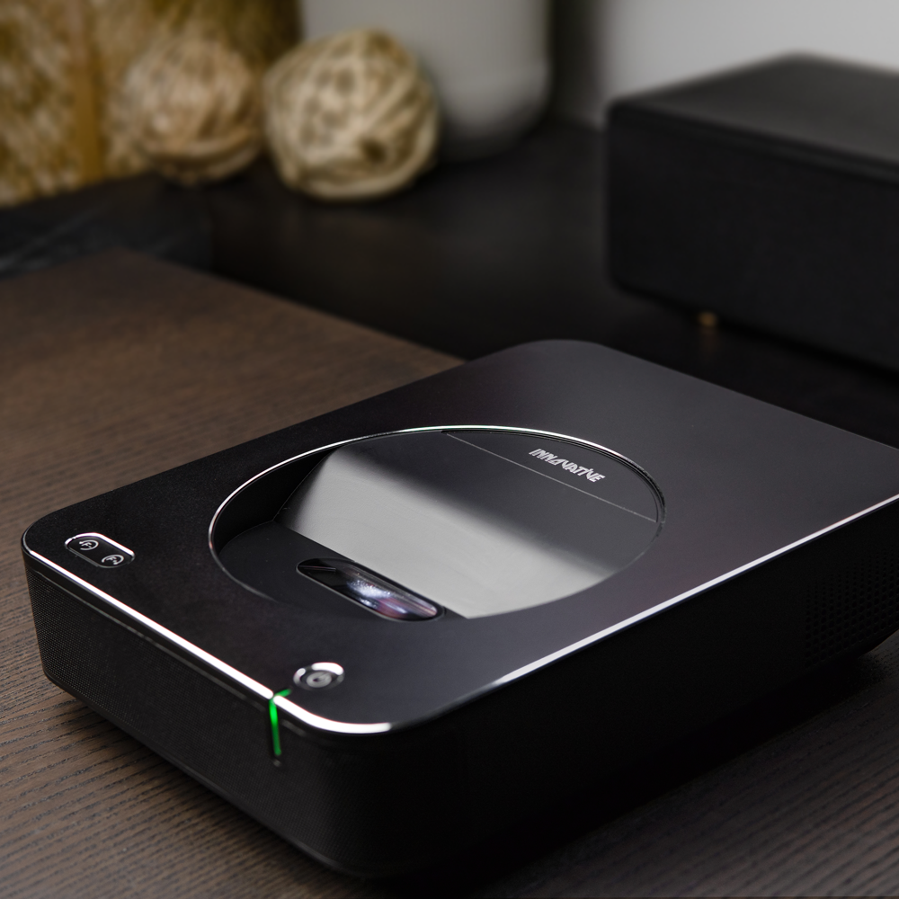 INNOVATIVE DSX Ultra Short Throw Projector on table